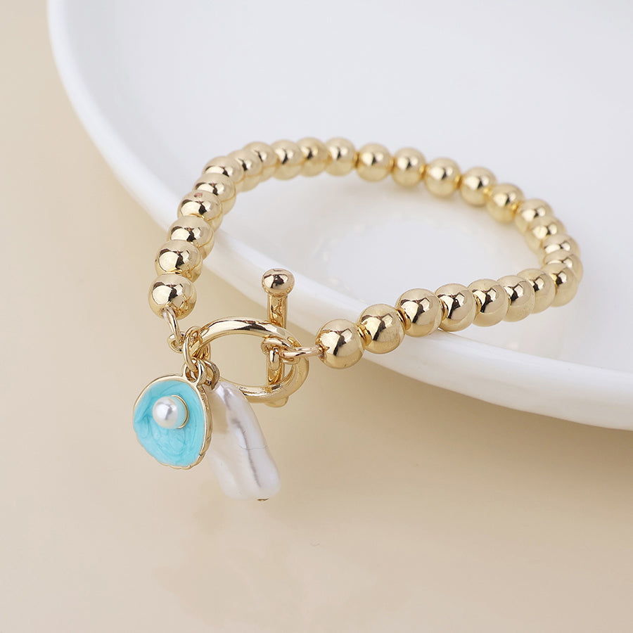T-bar Bracelet With Shell and Pearl Charms | Gold