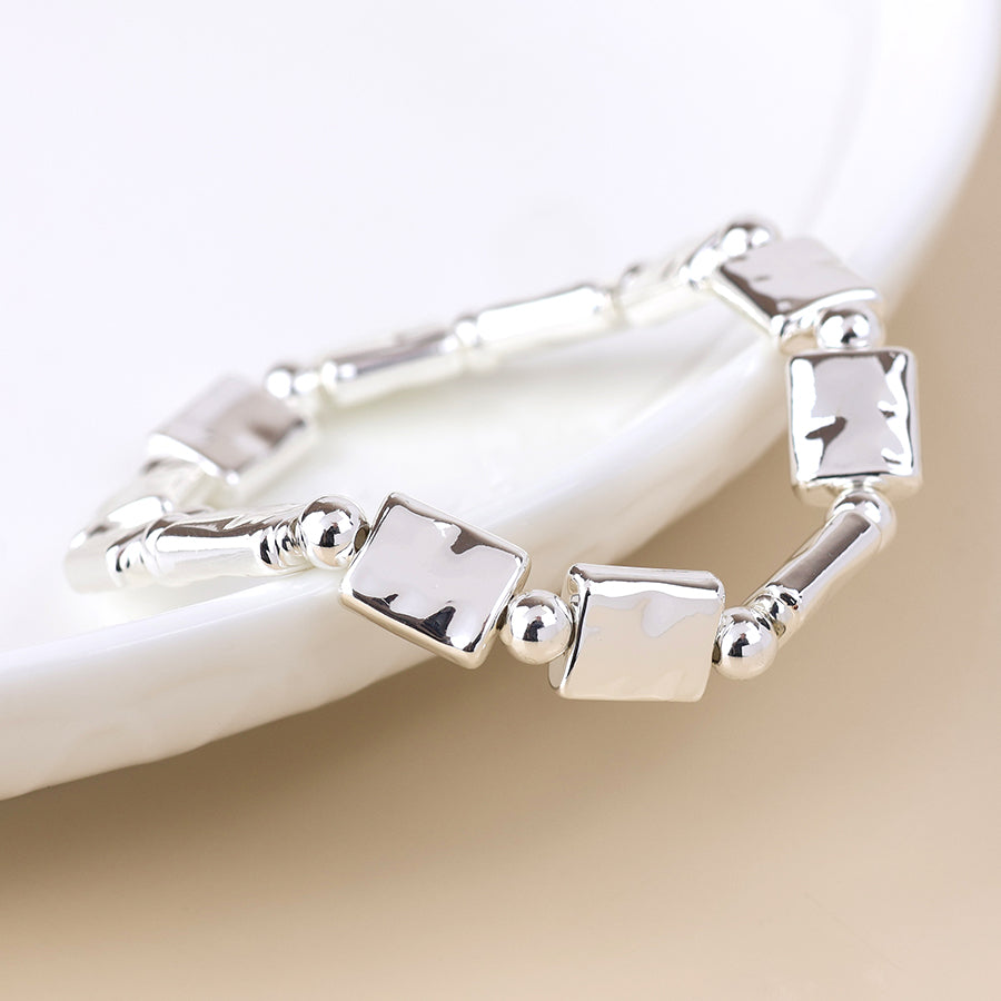 Cassia silver plated polished bead and oblong stretch bracelet
