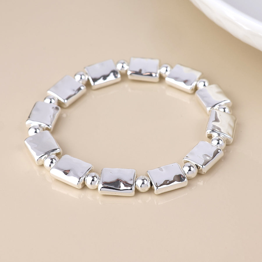 Cassia silver plated polished bead and oblong stretch bracelet