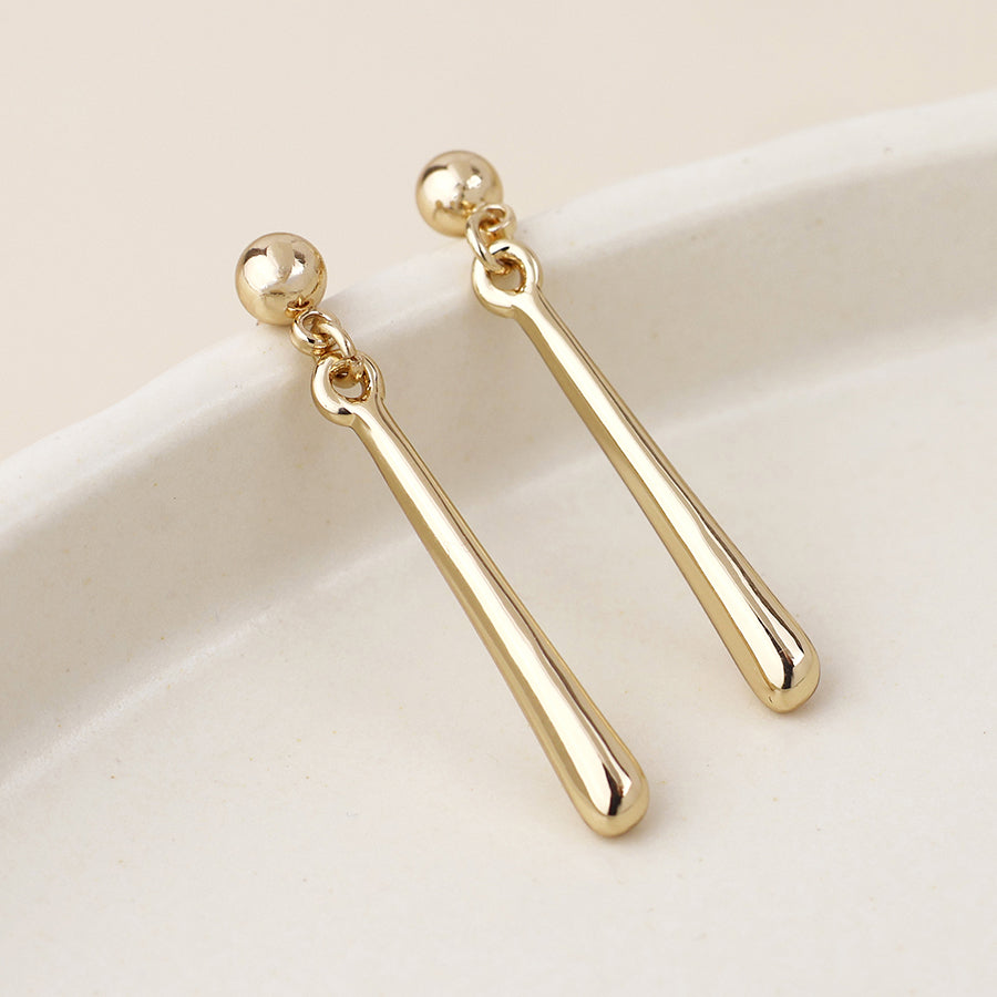 Cassia golden smooth bar drop earrings