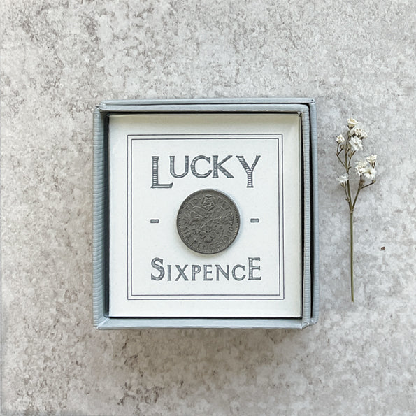 Sixpence | Lucky