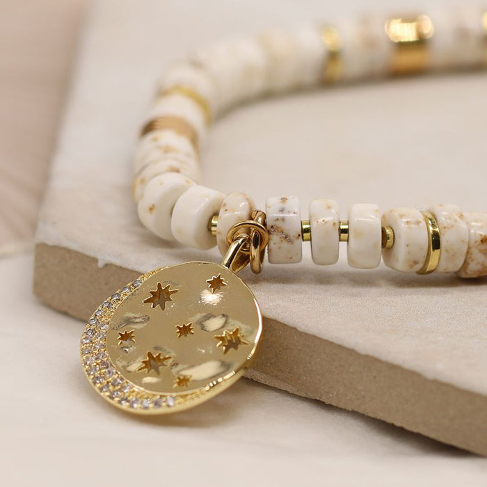 White Bead Bracelet With Golden Star Disc Charm